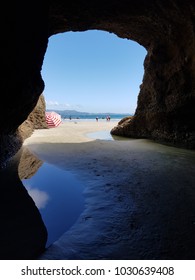 Viewing the beach from the arch