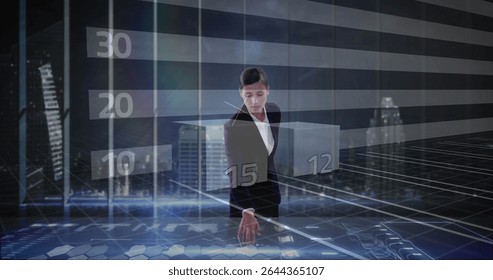 Viewing businesswoman wearing suit using translucent interface in control room, showing bar charts. Futuristic, technology, data, digital, professional, virtual, innovation