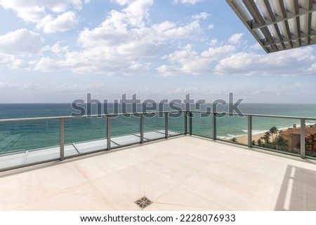 viewpoint of balcony overlooking the sea and miami beach, horizon line turquoise sea and blue sky