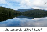 Views along the Sasamat lake trail and bay in Belcarra regional park, Port Moody, BC, Canada