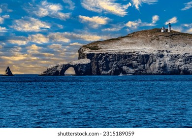 Views of Arch Rock on Anacapa Island from a boat in Channel Islands National Park - Shutterstock ID 2315189059