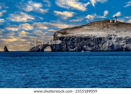 Views of Arch Rock on Anacapa Island from a boat in Channel Islands National Park