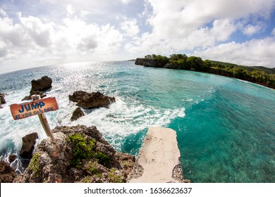 Views of the coastline and boston beach with turquoise water and cliff jumping place from the cliffs in Jamaica Portland