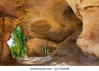 Views Of The Forest Through An Archway From Inside Sandstone Caves In Pilliga Nature Reserve, New South Wales, Australia.