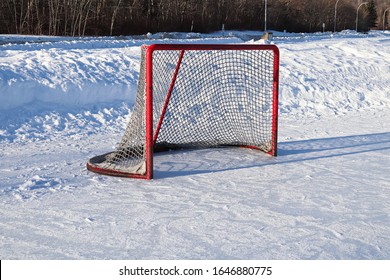 Views Of A Hockey Net On An Outdoor Rink