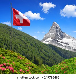 Views of the Matterhorn with Swiss flag - Swiss Alps 