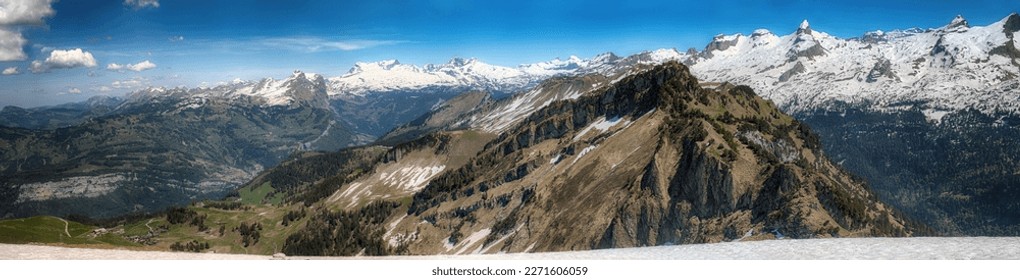 Views on Alps from Fronalpstock peak near small village of Stoos in central Switzerland