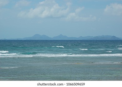 Views Towards The Island Of Saint Martin From The Tranquil Beach Of Maundays Bay, With Its Private Atmosphere And Tropical Ambiance, On The South-west Coast Of Anguilla, British Overseas Territory