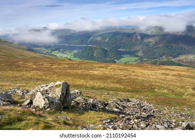 Views towards lake Thirlmere and summits of Great How and Middle Crag from Calfhow Pike in the English Lake District, England, UK. - Shutterstock ID 2110192454