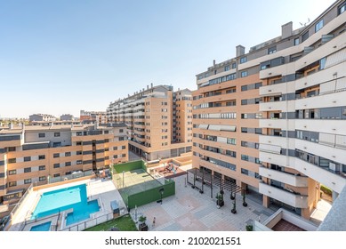 Views Of Urban Residences With Community Pool And Tennis Court