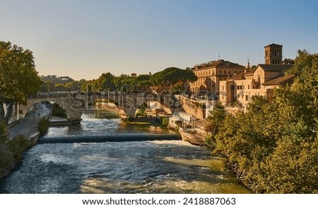 Views while strolling along the banks of the Tiber in rome