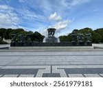 The Vigeland Fountain in Vigeland Park, Oslo, showcasing the dynamic and intricate design by Gustav Vigeland, featuring sculptures of human figures and powerful water flow.