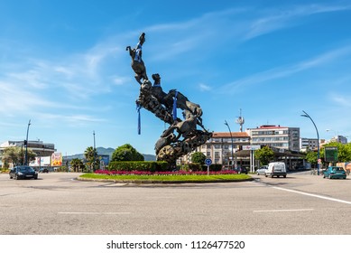 Vigo, Spain - May 20, 2017: Horse Sculpture In Spain Square (Plaza De Espana) Of Vigo City, Galicia, Spain. Football Shirts Hanging.