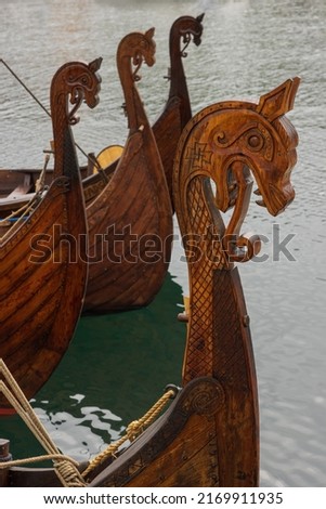 viking ships with dragon heads

