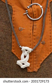 viking thor's hammer carved in white horn as viking jewelry concept