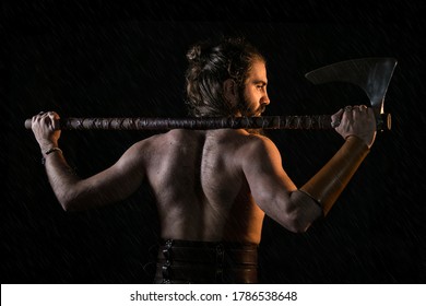 Viking Warrior Standing With Axe On The Shoulders, Medieval Bearded Man