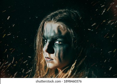 Viking Woman, Pagan Shaman With Painted Face, Looking In The Darkness With Sparks Flying