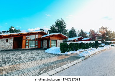 Villa In Balkans Mountains. Luxury Chalet House Exterior, Winter. Europe, Bulgaria. 