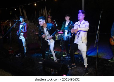 villa carlos paz, cordoba, argentina - October, 21 2021: cumbia singers giving a concert in cordoba capital