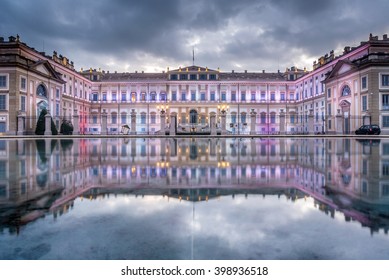 Villa Reale reflex in the water in cloudy morning, Royal Palace, Monza, Italy