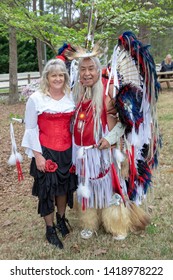 Villa Rica, GA / USA - April 13, 2019: Cowboy Festival 2019 At Pine Mountain Gold Museum. Native American Indian With Saloon Girl From The Old Wild West, Early Pioneers Dressed In 1800s Clothes.