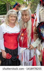 Villa Rica, GA / USA - April 13, 2019: Cowboy Festival 2019 At Pine Mountain Gold Museum. Native American Indian With Saloon Girl From The Old Wild West, Early Pioneers Dressed In 1800s Clothes.