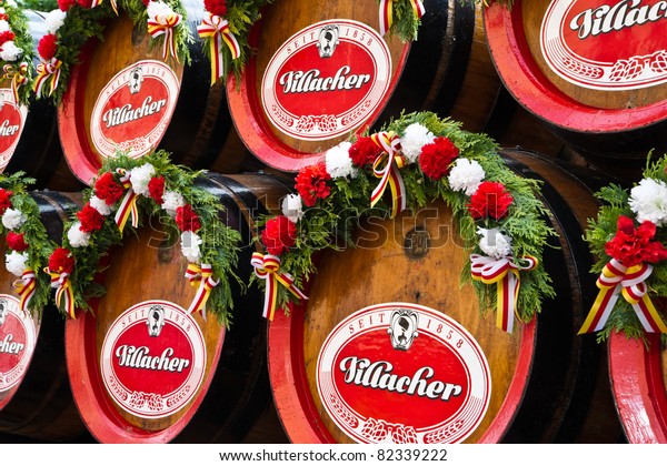 VILLACH, AUSTRIA - AUGUST 6: Old wooden beer\
barrels at a traditional beerwagon at the \'Villacher Kirchtag\', the\
largest traditional folk festival in Austria, August 6, 2011 in\
Villach, Austria.