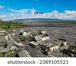 The village after the eruption of the Semeru volcano on December 4, 2022. Java Island, Indonesia