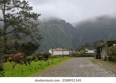 Village in Azores Islands on foggy day - Powered by Shutterstock