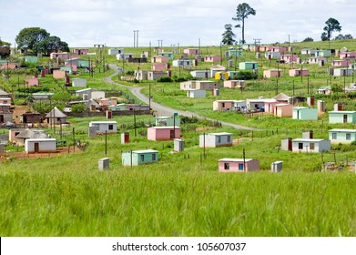 A Village Of Brightly Colored Mandela Houses In Zulu Village, Zululand, South Africa