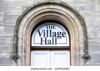 Village Hall Sign Above Building Entrance Door