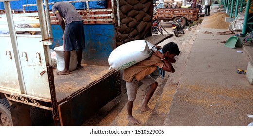 Village Man Unloading Rice Sack From The Pickup Truck At Agriculture Produce Market District Katni Madhya Pradesh In India Shot Captured On Sep 2019