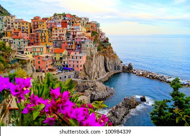 Village of Manarola, on the Cinque Terre coast of Italy with flowers