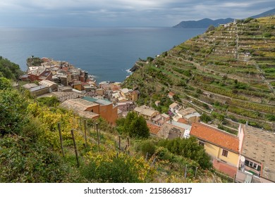 The village of Manarola is the town of Manarola from the top of the mountain Cinque Terre