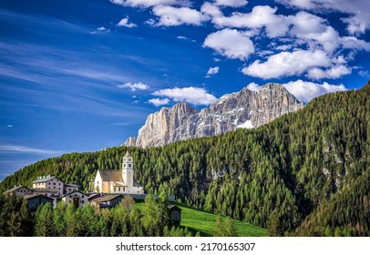 A village in the mountains. Alpine mountain village. Beautiful Alpine mountain landscape. Mountain village in Alps
