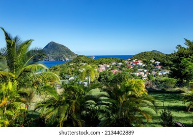 Village on the island of Terre-de-Bas, Iles des Saintes, Les Saintes, Guadeloupe, Lesser Antilles, Caribbean.Island Terre-de-Haut in the background.