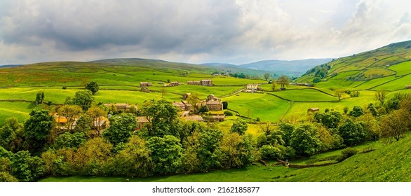 A village in a picturesque mountain valley. Valley village panorama. Village in valley panoramic landscape. Green valley panorama - Shutterstock ID 2162185877