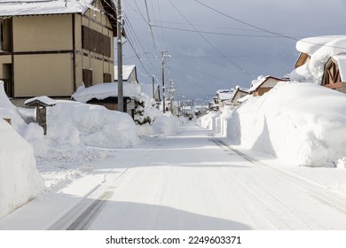 Village road in heavy snow