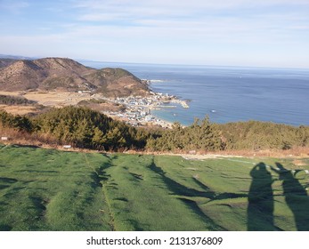 The Village And The Sea Seen From The Downhill Slope