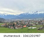 Village Steffisburg (Switzerland) in front of Town Thun near the Swiss Alps