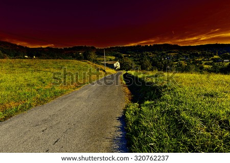 Village Surrounded by Fields in the French Limousen;  Sunset
