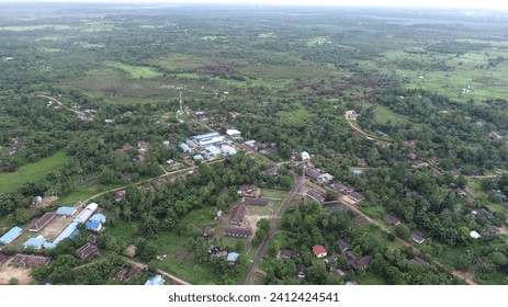 village surrounded by forests drone photography