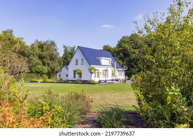 Village View With White House, Fencing And Garden Of Small Village Tolbert In Municipality Westerkwartier In Groningen Province The Netherlands