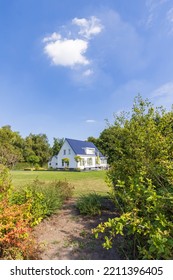 Village View With White House, Fencing And Garden Of Small Village Tolbert In Municipality Westerkwartier In Groningen Province The Netherlands