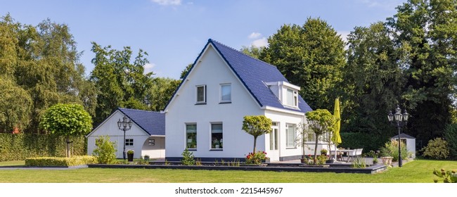 Village View With White House, Fencing And Garden Of Small Village Tolbert In Municipality Westerkwartier In Groningen Province The Netherlands