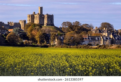 The village of Warkworth and it's ruined medieval castle in the county of Northumberland, northeast England. The castle dates from around 1157.