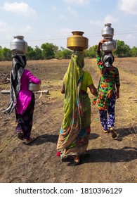 The Village Women Carrying Water