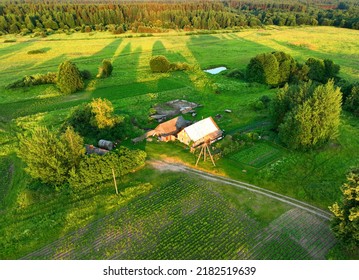 Village Wooden House. Country Houses In Countryside, Aerial View. Rural Building And Farmhouse In Countryside. Сountry House. Suburban House In Rural. Roofs Of Village Home. Agricultural Development.