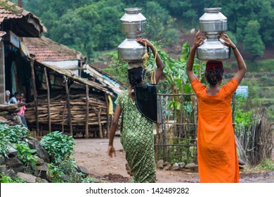 Villagers Carry Water In A Remote Part Of India