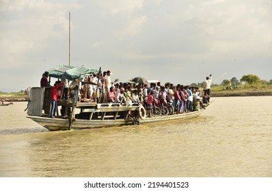 Villagers Travell In A Boat   At Milpara In  Kamrup District Of Assam India  On Thursday 25th August 2022